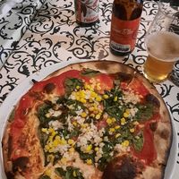 pizza with tomato sauce, garlic, spinach & sweet corn at Vinum at Fontanella in Mdina