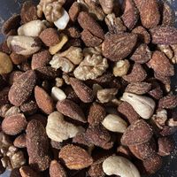 A combo of raw nut mix + BBQ almonds. It’s savoury and very tasty! And of course healthier than regular ‘borrelnootjes’.  at LOOS Utrecht in Utrecht