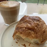 oat milk latte and pain au chocolat  at To Live For in Vancouver