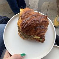 Croissant breakfast sandwich with sausage   at To Live For in Vancouver