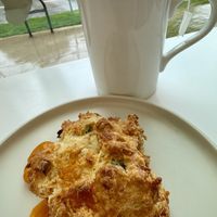 Rooibos latte and cheddar chive scone  at To Live For in Vancouver