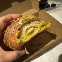 Pistachio croissant 🥐 with rich pistachio filling yum 🤤   at To Live For in Vancouver