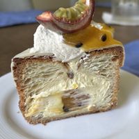 Passionfruit cube croissant 💜   at To Live For in Vancouver