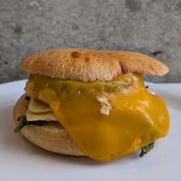 English Muffin Breakfast Sandwich with Sausage at To Live For in Vancouver