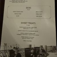 Back of the menu, showing the coconut curry dish (the picture is a little blurry because I was photographing in dim light) at Frontier Tavern in Bedford