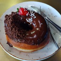 Chocolate doughnut at Holy Donut - Vilniaus in Vilnius