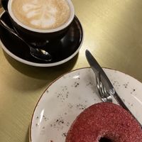 Raspberry&cranberry doughnut and almond milk cappuccino   at Holy Donut - Vilniaus in Vilnius