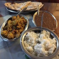 Naan, rice, curry with cauliflower, kidney bean dish.  I don't remember the exact names... at Sumathi Indian Restaurant in Belize City