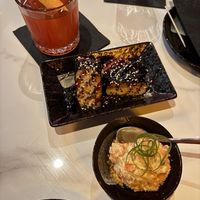kimchi potato salad, musubi and cocktail  at Wild Orange in Honolulu