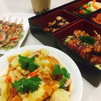 wonton in chili oil, calamari skewer, sweet chili chicken rice.  at Kuan Yin Tea House in Southport