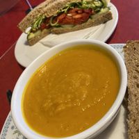 Hummus and veggie sandwich with their soup of the day with bread. This soup was a very cozy carrot ginger.  at Rocket Bakery Water Street in St Johns