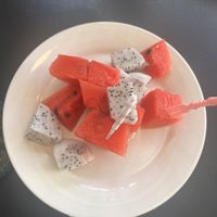 When finished eating, they bring a plate of fruit  at King Of Sandwich in Phan Thiet
