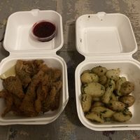 schnitzel with potatoes and sauce at Let‘s be Frank in Vienna