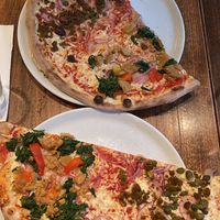 Pizza with vegan tuna // pizza with vegan chicken. Both tasty but nothing super special. Tuna tasted better than chicken  at L'Osteria in Kassel