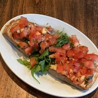 Bruschetta. Tasty, can’t go wrong with it  at L'Osteria in Kassel