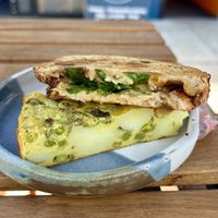 Spilt of frittata and toastie  at Herbivore Vegan Deli in Bristol