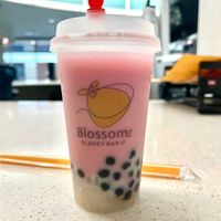 Sakura oat milk tea with regular boba and lychee jellies 😋   at Blossom Juicy Bar - Dayton Mall in Dayton