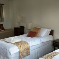 Twin bedroom at Fairfield House in Williton