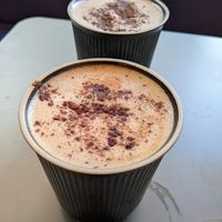 Dirty chai and hot chocolate, both with oat milk at Foodstory in Edinburgh