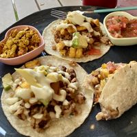 El Tico, Gallo Pinto topped with sweet plantains, avocado and house-made mayonnaise. Side of tofu and pico. Divine.  at Flora Vegan Cafe in Tamarindo