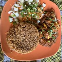 Aww Jollof rice done right! 😋  at Assase Pa - The Earth is Good in Accra