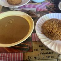 Groundnut soup with jolloff  at Assase Pa - The Earth is Good in Accra