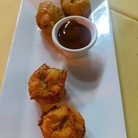 Potato pancakes are vegan with the tamarind sauce, if you leave off the yogurt sauce. Vegan server told us this. Very fluffy. at Judy's On Cherry in Reading