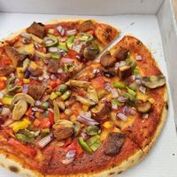 Vegan chicken pizza without cheese at Sardarjee in Leeds