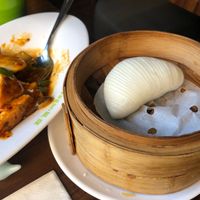 Mushroom tofu dish and a bao bun at Tofu Vegan - Spitalfields in East London