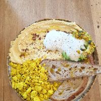 Kickstarter (scrambled tofu, hummus, bread, avocado, vegan yogurt) at M Cafe in Carcavelos
