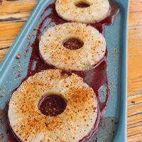 Ananasscheiben mit Tajin und Himbeersauce at Bocciabahn Tübingen - Juegos de Bochas in Tubingen