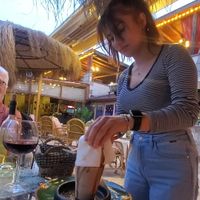 Braking the claypot at Aysel'in Mutfağı in Nevsehir