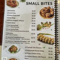 Vegan options marked with green leaf symbol   at Onederz Hostel in Siem Reap