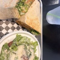 Buffalo chicken wrap w/side salad  at Vine Vegan in Brandon