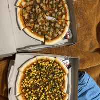 Take away pizzas   at Unity Bistro Pizza House in Dharamkot