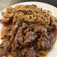 Citrus chicken with plantain and peas  at Starving Vegan in Brooklyn