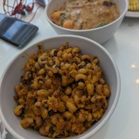 Awojoh Binch and groundnut stew in the background at West to West Kitchen in Abu Dhabi