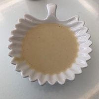 Amazing salad dressing/dipping sauce   at West to West Kitchen in Abu Dhabi