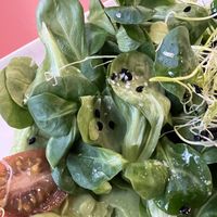 Lamb lettuce on the avocado toast *very fresh and tasty*  at Uli Brunch in Barcelona