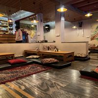 Floor seating and bar   at Rakus Place in Dharamshala