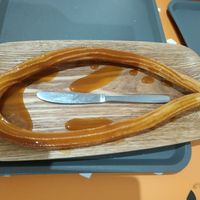 Vegan caramel tofu, knife for size reference at Churrissimo in Zaragoza