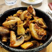 Fried mushrooms, delicious, much onions. It's better to eat until it's hot. at Pizza Jazz in Gyumri