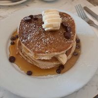 Pancakes with bananas, dark chocolate drops, maple syrup at POG in Howth