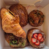 Plain croissant: good; Pain au chocolat: delish; Maple black pepper $9: really good; Strawberry danish $9.50; Garlic bread croissant $10: soft texture, nice chilli oil at Croix Croissant in Flemington
