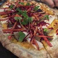 Beet flatbread with cashew milk cheese   at Luma Riverfront Bar & Eatery in Petaluma