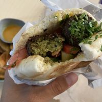 Falafel which kinda tasted store bought. Bread was nice but soaked all the sauce and was wet and sloppy at the end.  at The Pita Man at Selina in St Kilda