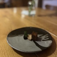 Quince with carobs coffee and vegan hazelnut cheese  at Galerija Okusov in Petrovce