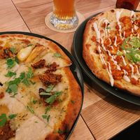 Himmel & Äd and Stranger Wings pizzas  at Virtuous Pie in Cologne