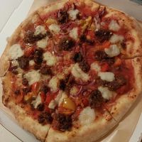 Sweet pepper and sausage pizza at Virtuous Pie in Cologne