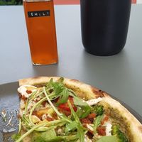 Pesto pizza so good that I ate half of it before realizing that I wanted to take a picture at Virtuous Pie in Cologne